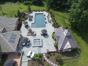 Overhead-view-of-landscaped-backyard-with-swimming-pool Overhead view of a landscaped backyard with swimming pool